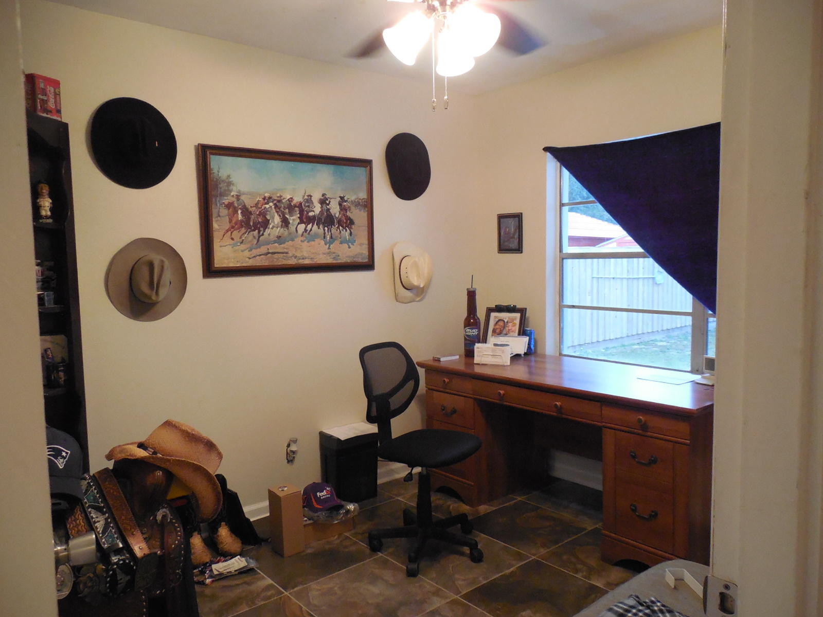 419 Marlowe Drive Fort Walton Beach, FL 32547 - Photo 11 of 12 a view of a workspace with furniture and a window