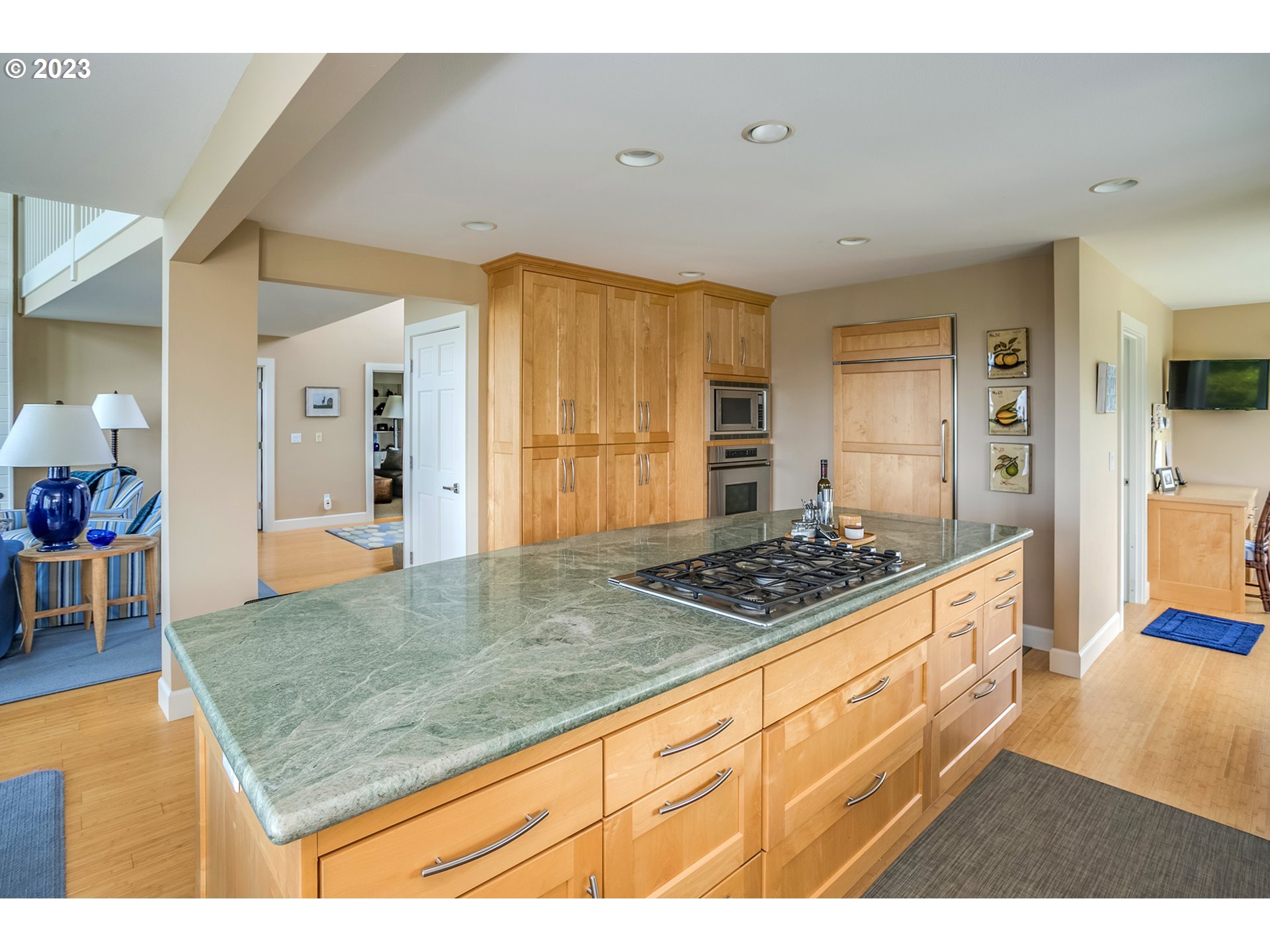 4710 High Ridge Road Gearhart, OR 97138 - Photo 13 of 44 a kitchen with stainless steel appliances granite countertop a stove and a sink