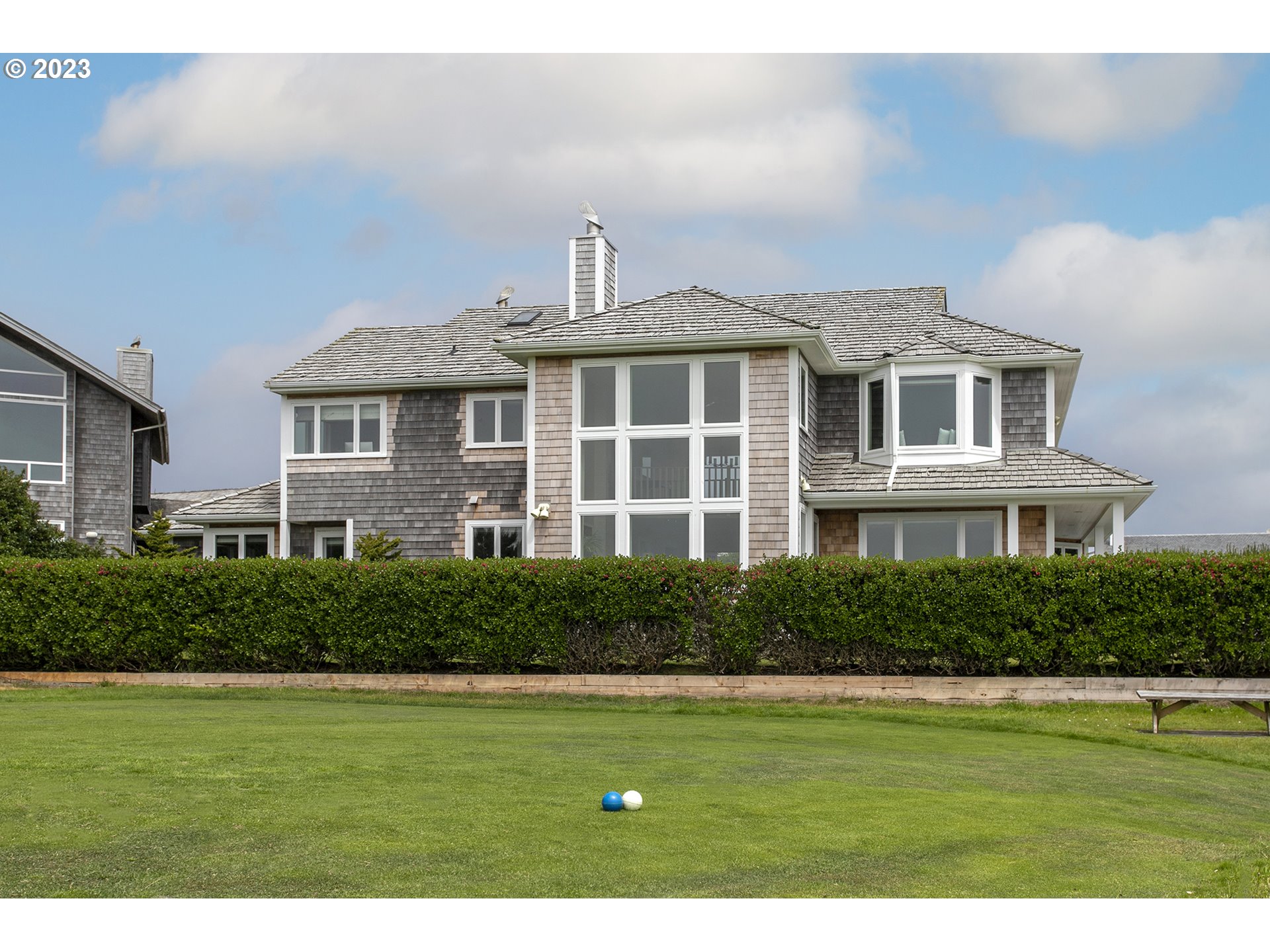 4710 High Ridge Road Gearhart, OR 97138 - Photo 35 of 44 a front view of a house with a yard