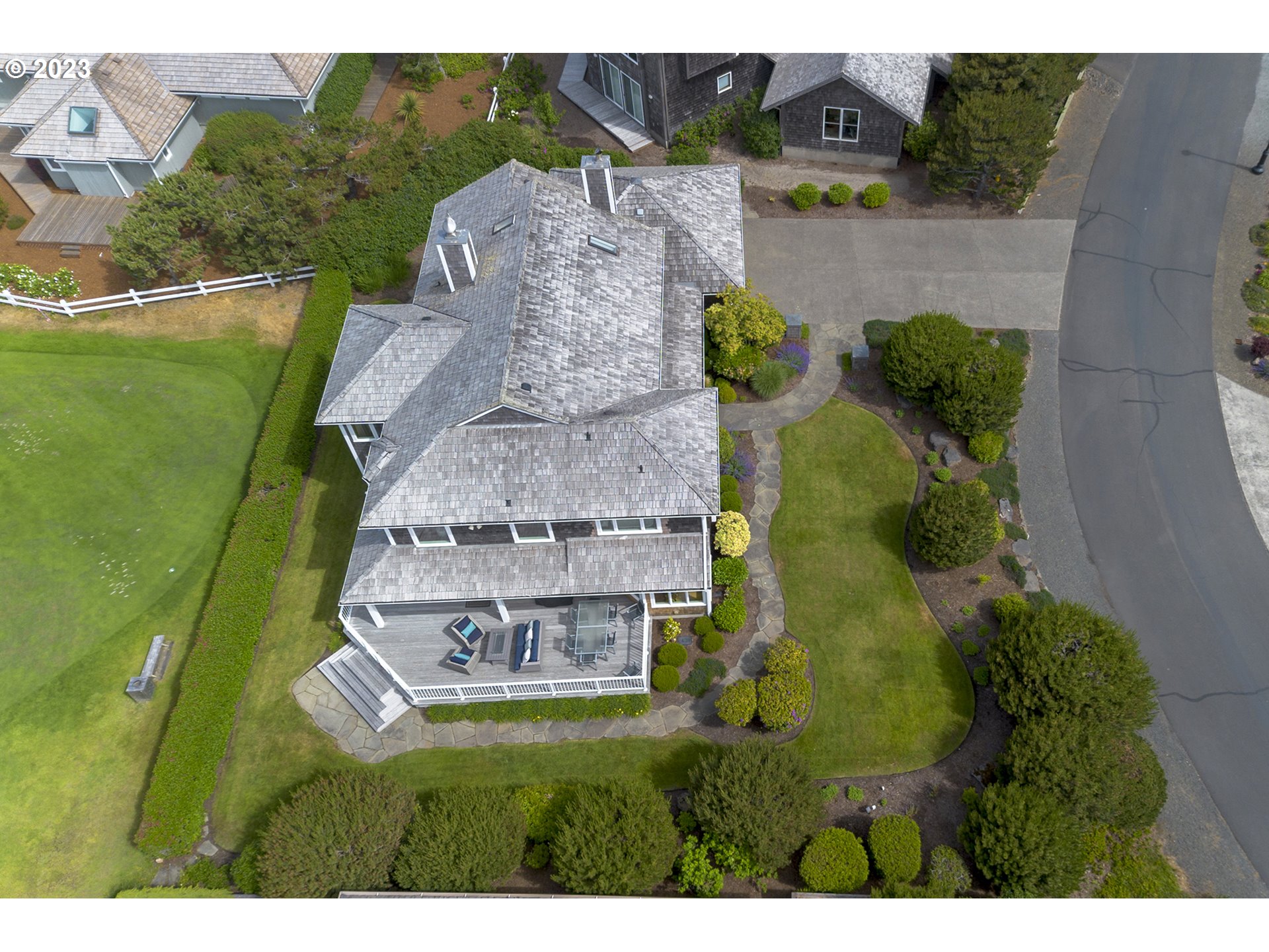 4710 High Ridge Road Gearhart, OR 97138 - Photo 44 of 44 a aerial view of a house with a garden