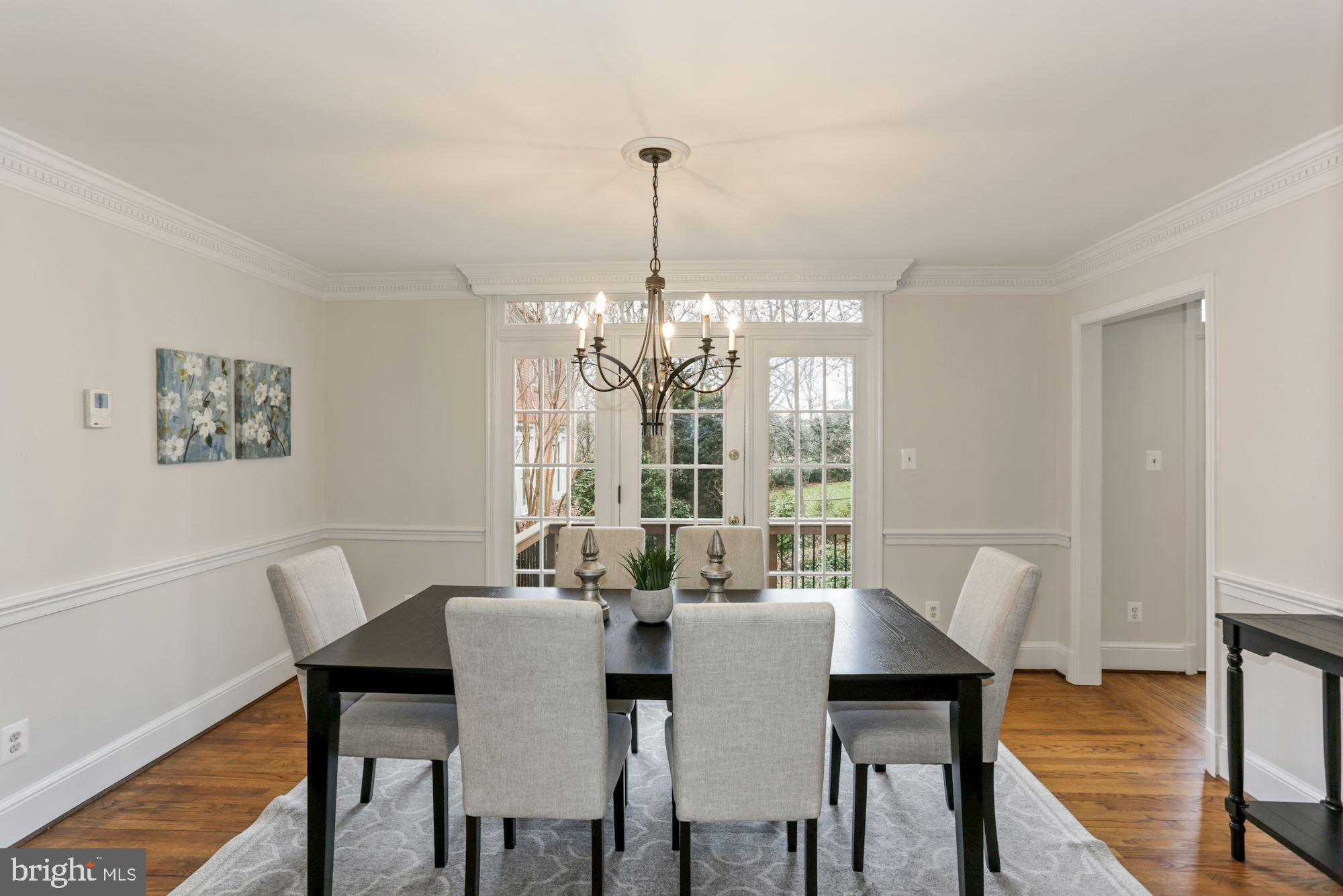 Sun-filled dining room with access to deck!