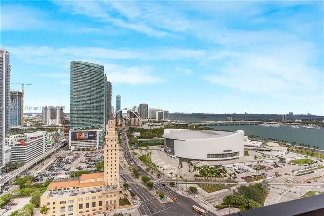 a view of a city with lawn chairs