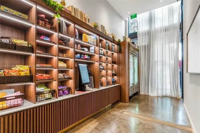 a view of a town with palm trees