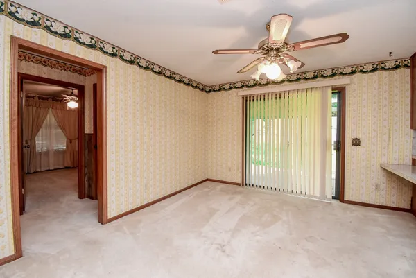 a kitchen with stainless steel appliances granite countertop a stove cabinets and refrigerator