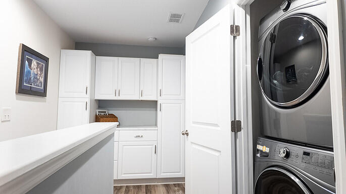 9135 Parlor Drive Ladson, SC 29456 - Photo 4 of 34 Upstairs laundry