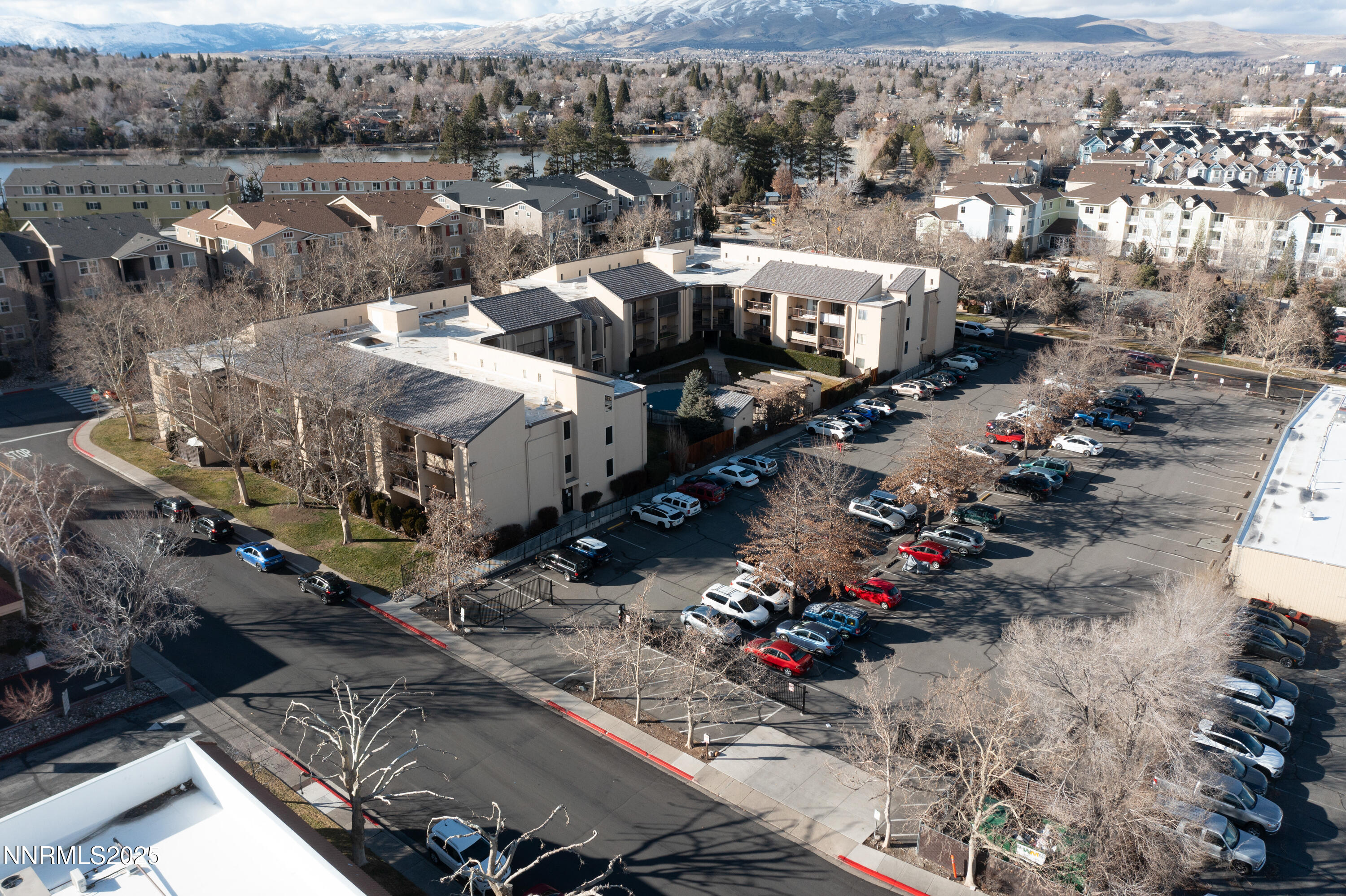 2450 Lymbery Street, Unit 213 Reno, NV 89509 - Photo 13 of 25 an aerial view of a town with parking