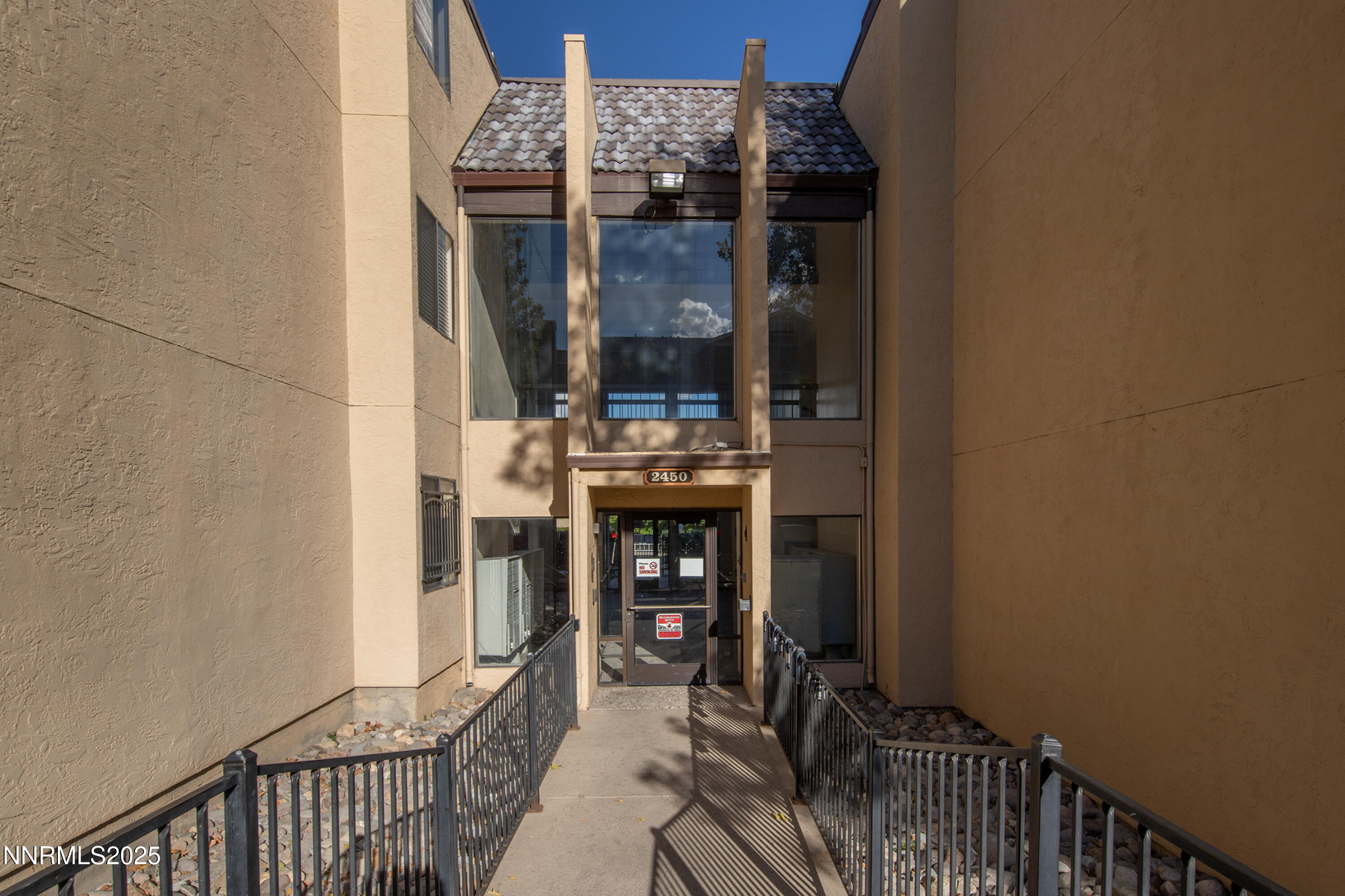 2450 Lymbery Street, Unit 213 Reno, NV 89509 - Photo 14 of 25 a view of a hallway with a dining room