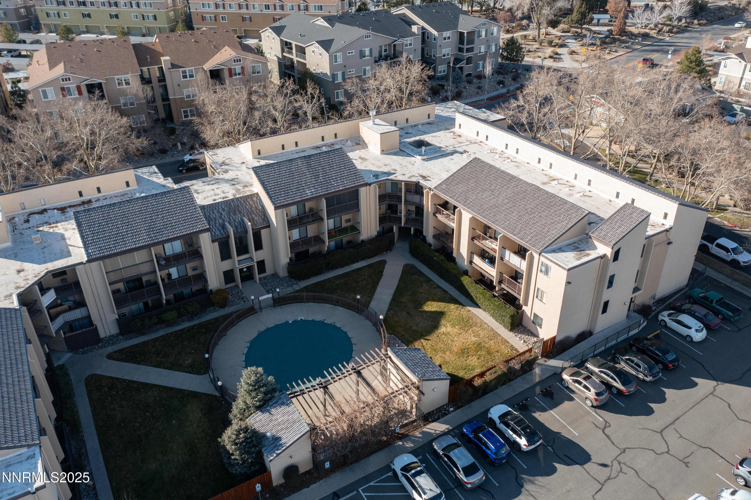 2450 Lymbery Street, Unit 213 Reno, NV 89509 - Photo 21 of 25 an aerial view of a house with pool patio and outdoor seating