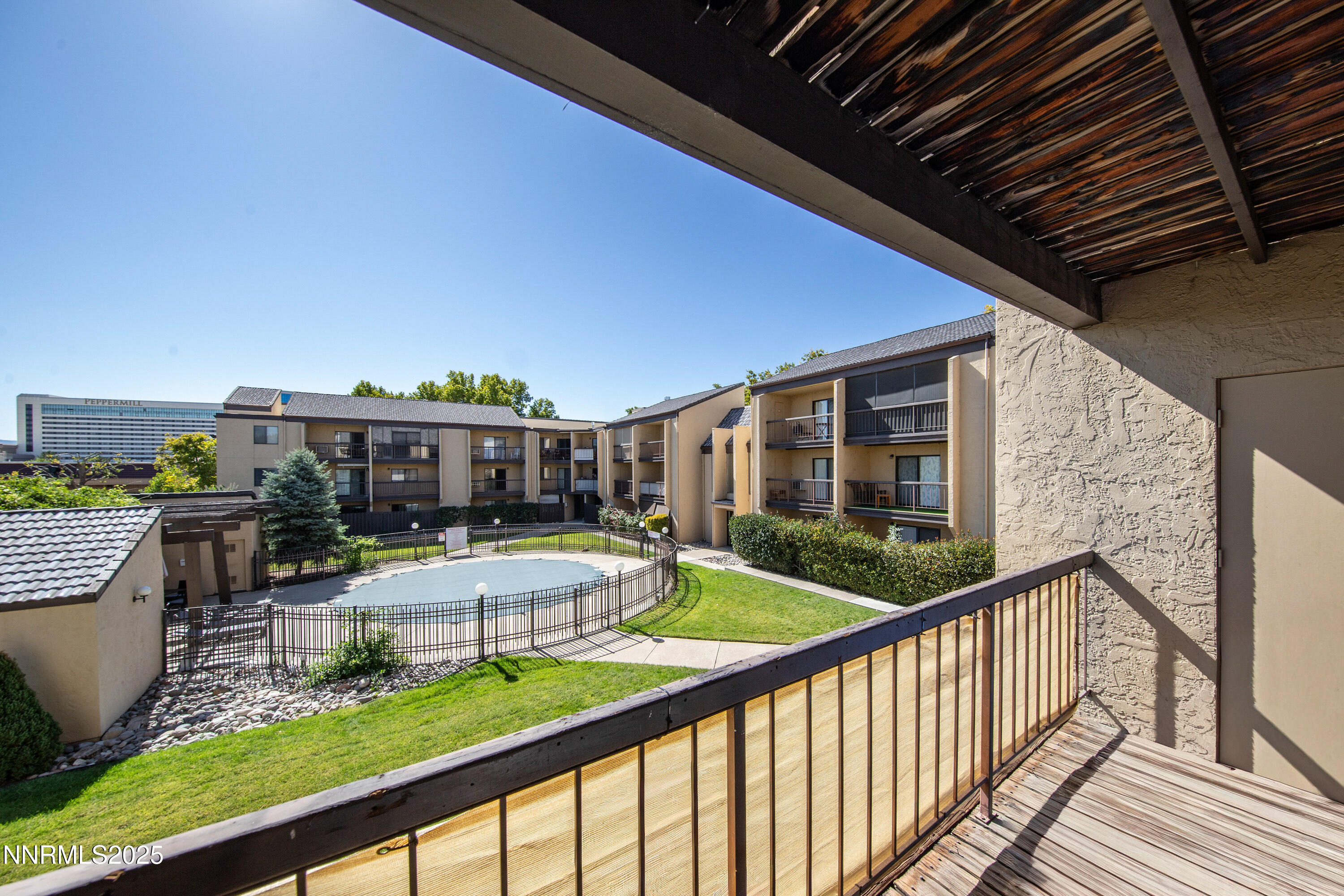 2450 Lymbery Street, Unit 213 Reno, NV 89509 - Photo 7 of 25 a view of a patio with chairs and a table