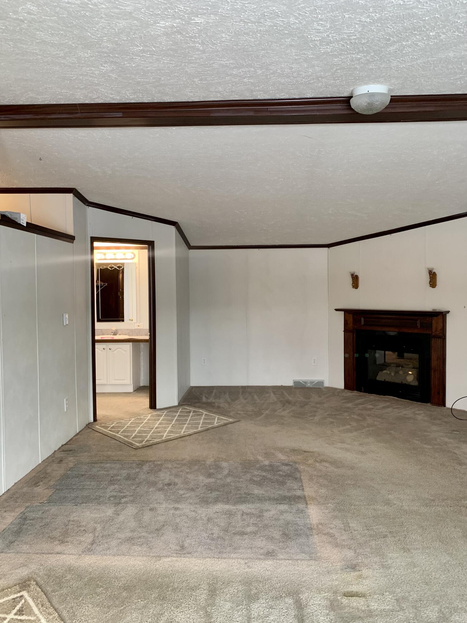 45 Round Top Road Bingham, ME 04920 - Photo 18 of 28 Master w/ gas fireplace