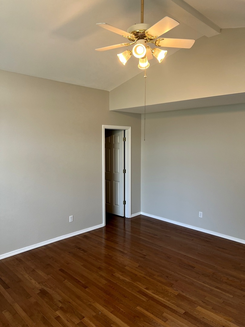 3123 Brookstone Danville, IL 61832 - Photo 14 of 20 a view of an empty room with wooden floor