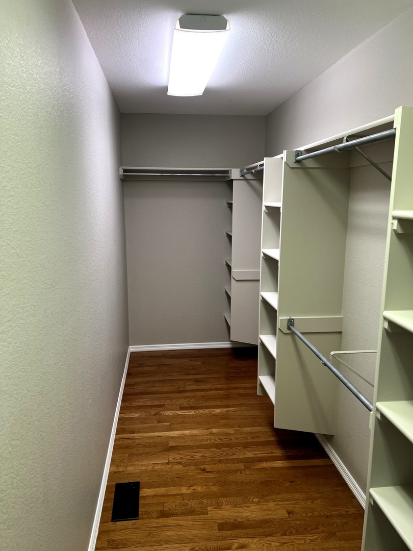 3123 Brookstone Danville, IL 61832 - Photo 17 of 20 a view of an empty room with wooden floor and a window