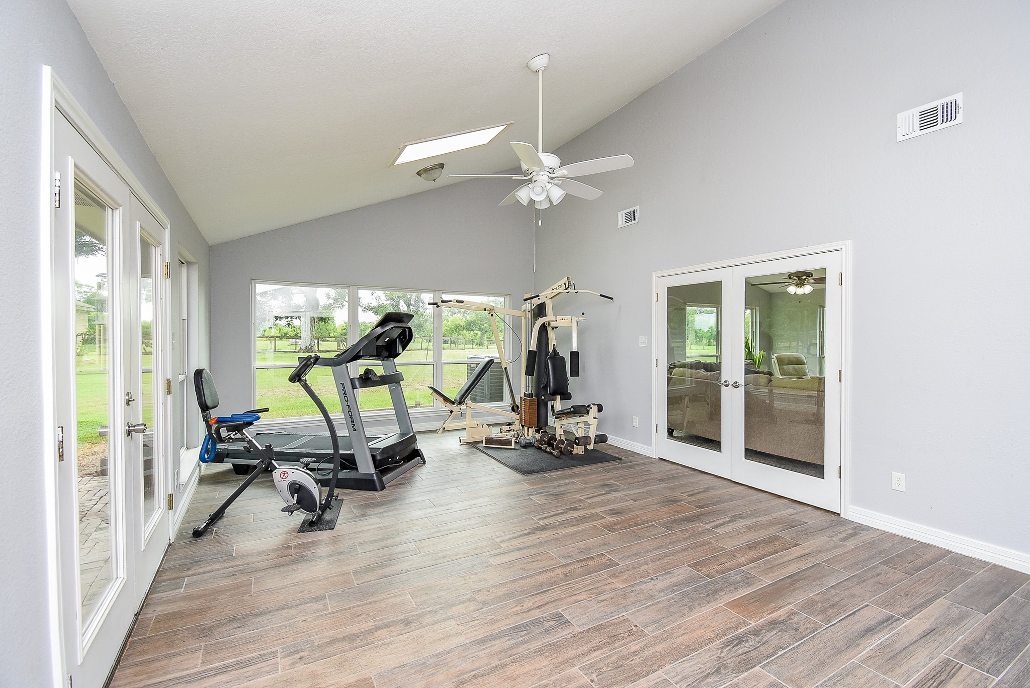 3818 County Road 36 Angleton, TX 77515 - Photo 15 of 49 a view of a room with gym equipment