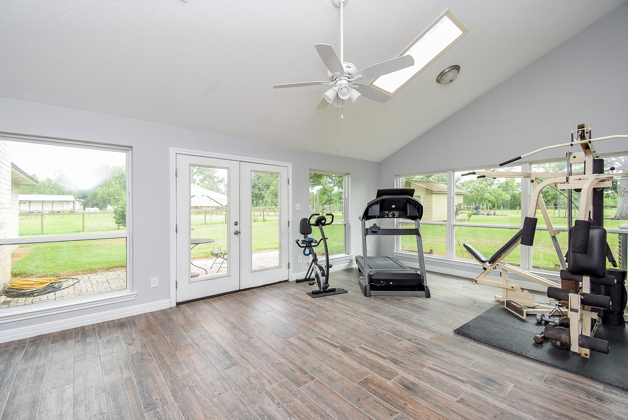 3818 County Road 36 Angleton, TX 77515 - Photo 16 of 49 a living room with furniture and large windows