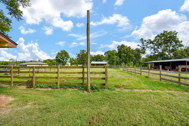 a view of a house with a big yard