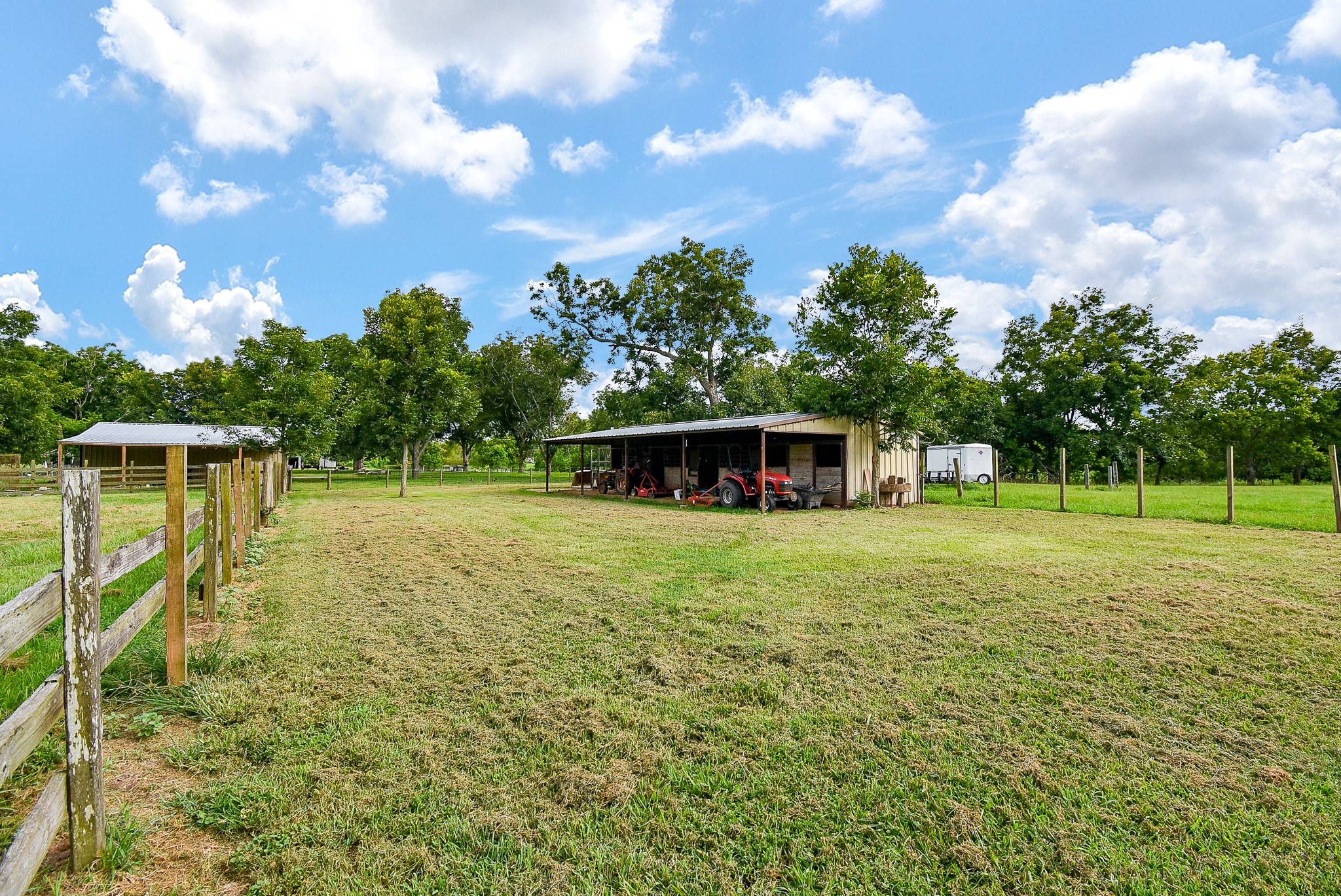 3818 County Road 36 Angleton, TX 77515 - Photo 39 of 49 a view of a house with a big yard