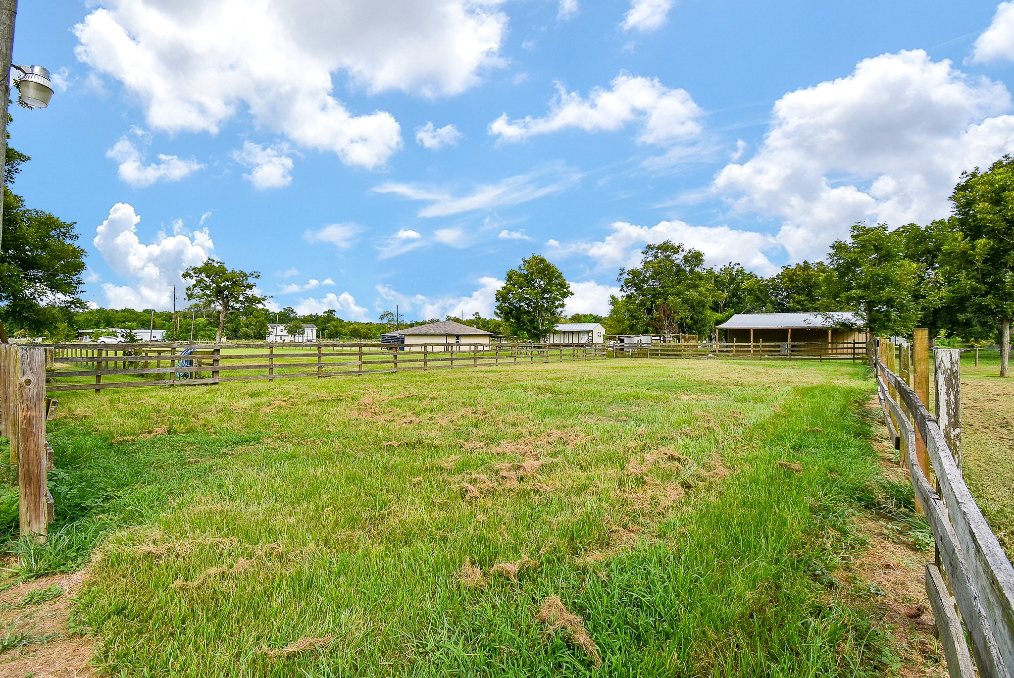 3818 County Road 36 Angleton, TX 77515 - Photo 40 of 49 a view of a golf course with a lake view