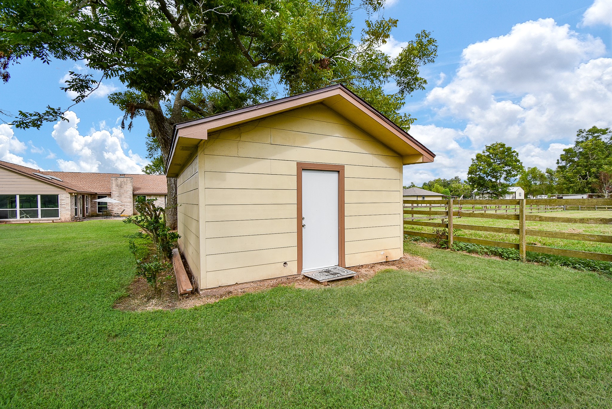 3818 County Road 36 Angleton, TX 77515 - Photo 42 of 49 a view of a house with a yard