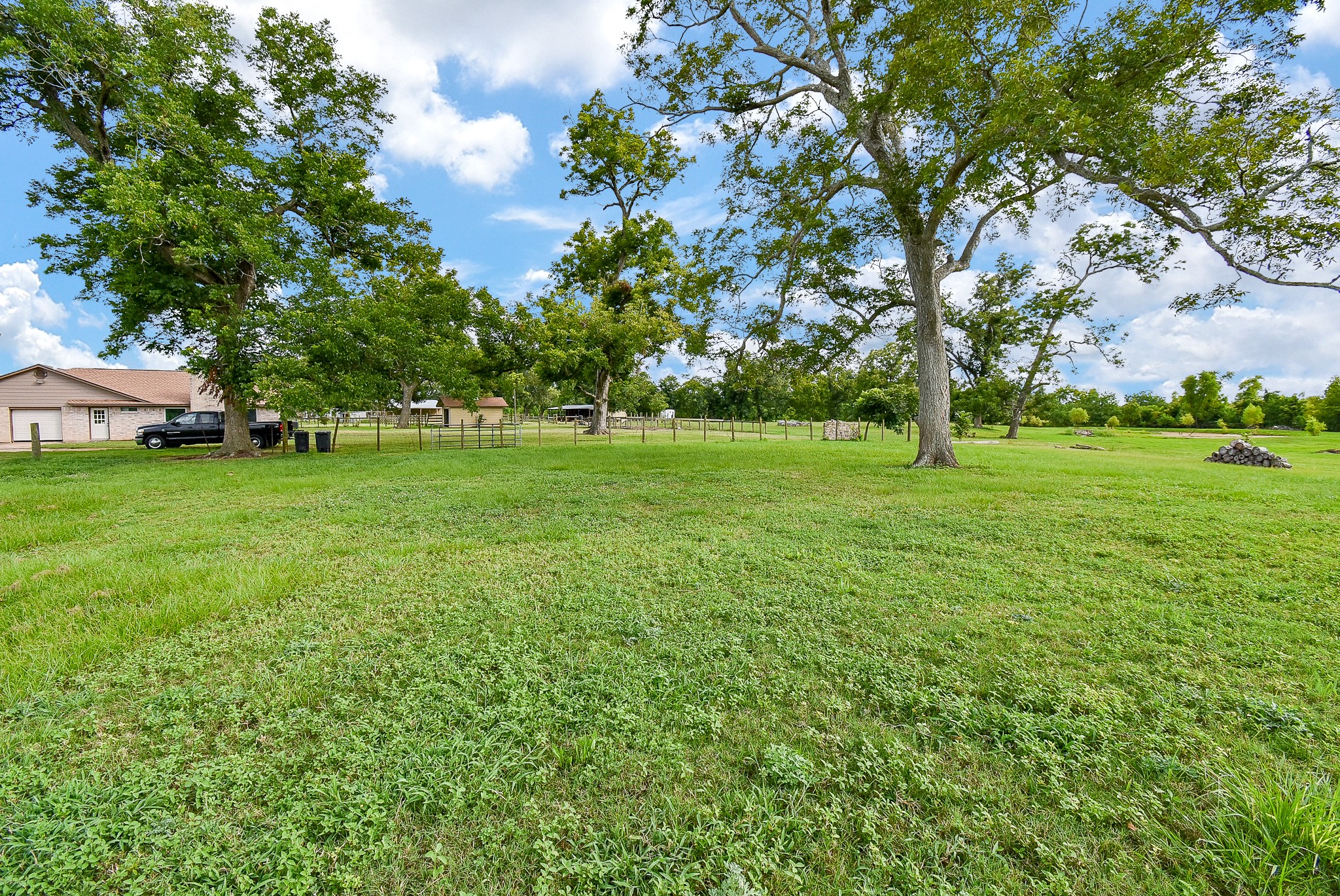 3818 County Road 36 Angleton, TX 77515 - Photo 46 of 49 a view of a grassy field with trees