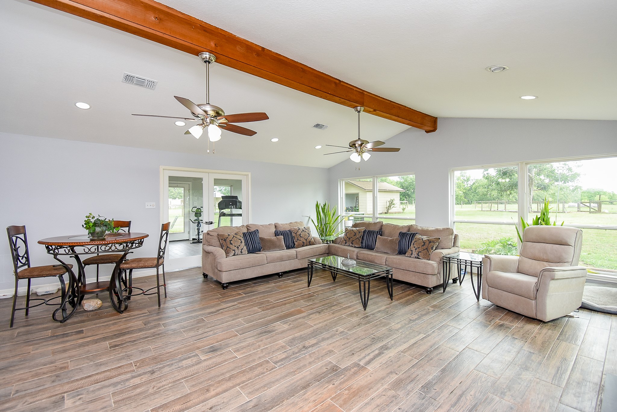 3818 County Road 36 Angleton, TX 77515 - Photo 6 of 49 a living room with furniture and a large window