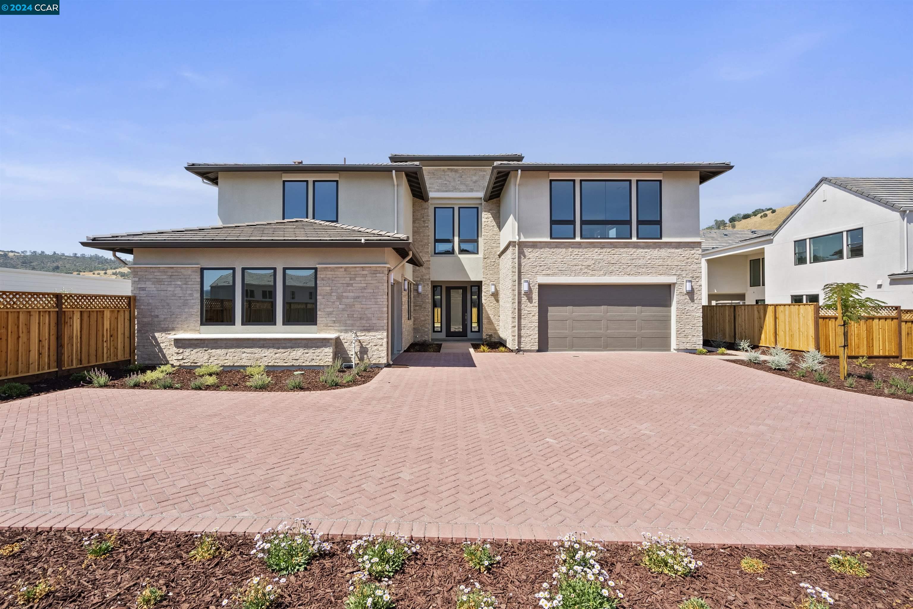 1980 Via Santa Elena Morgan Hill, CA 95037 - Photo 1 of 1 a front view of a house with a yard