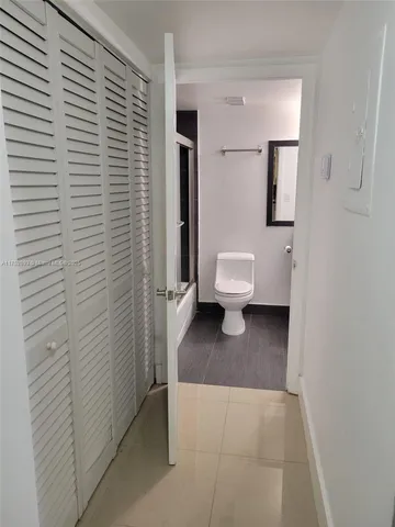 a view of a bathroom with a toilet