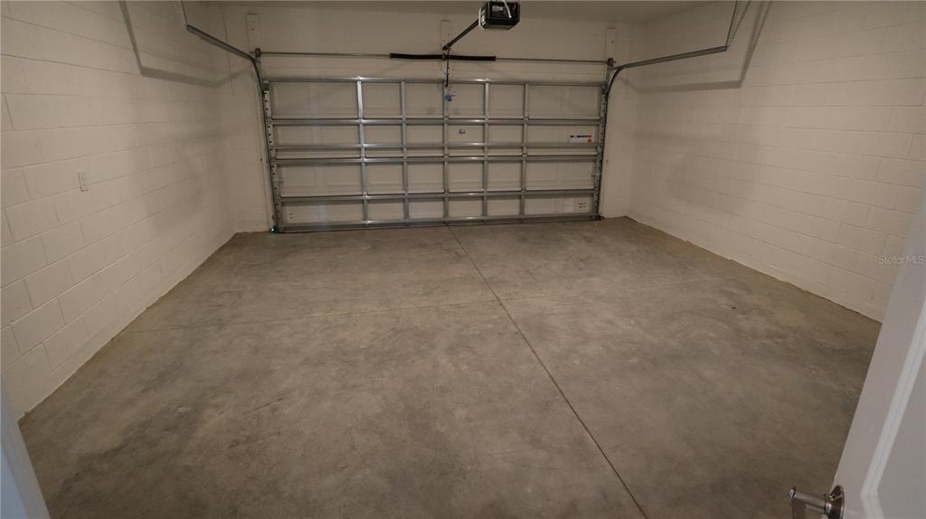 984 Top Minnow Road St. Cloud, FL 34771 - Photo 12 of 31 a view of a room with shelf