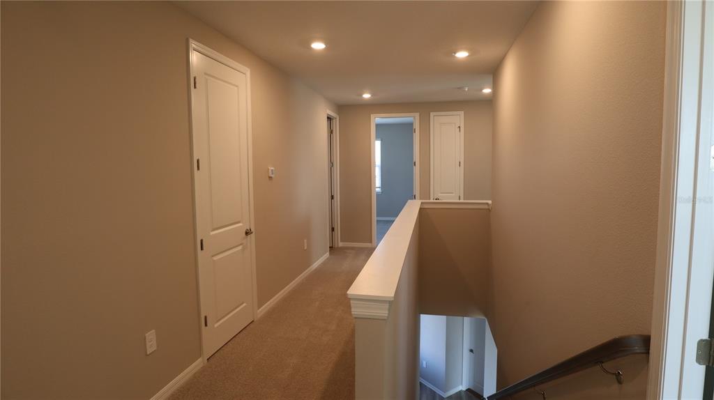 984 Top Minnow Road St. Cloud, FL 34771 - Photo 23 of 31 a view of a hallway with entryway