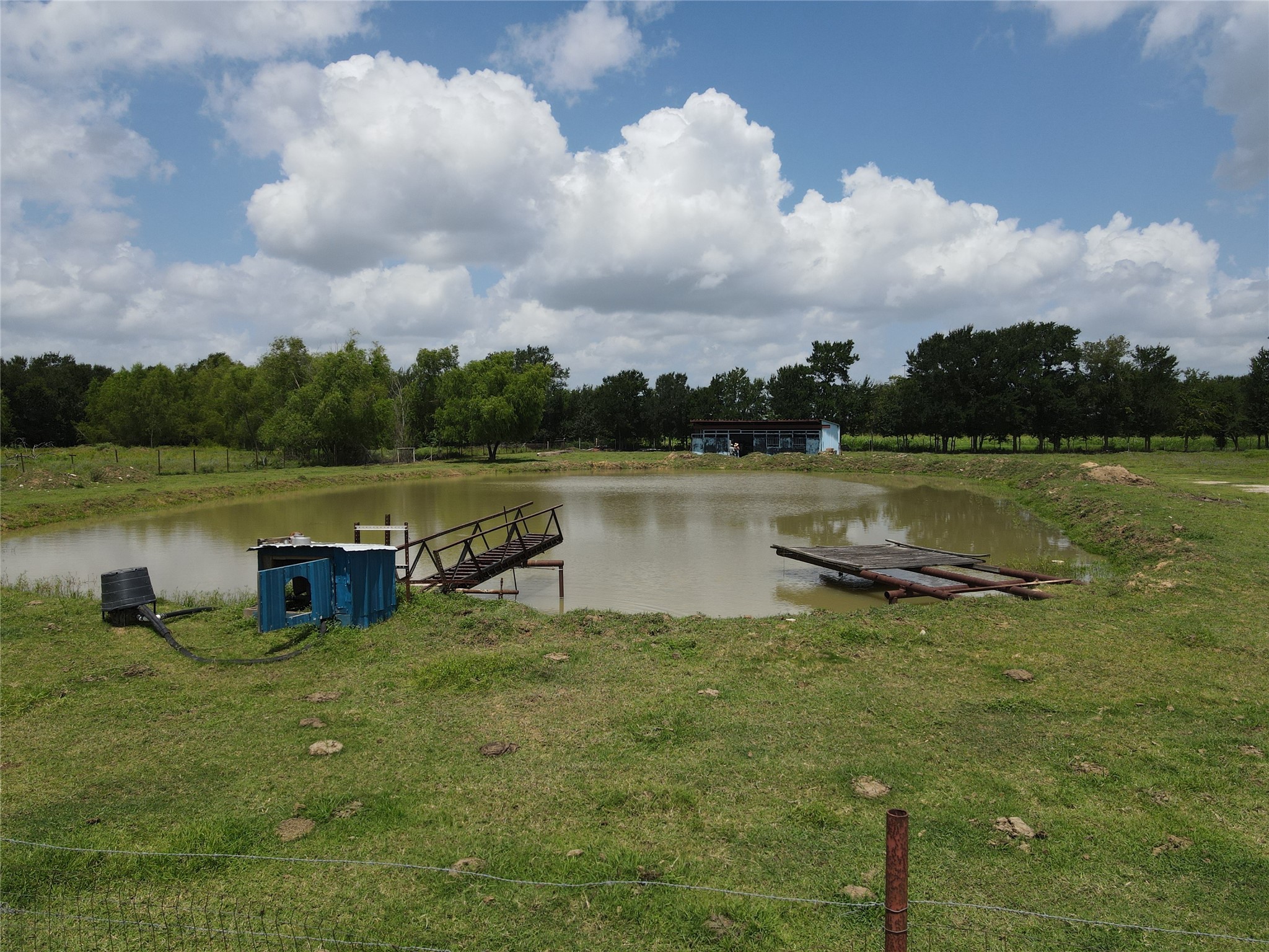 37110 Donigan Road Brookshire, TX 77423 - Photo 14 of 43 a view of a lake with houses in the back