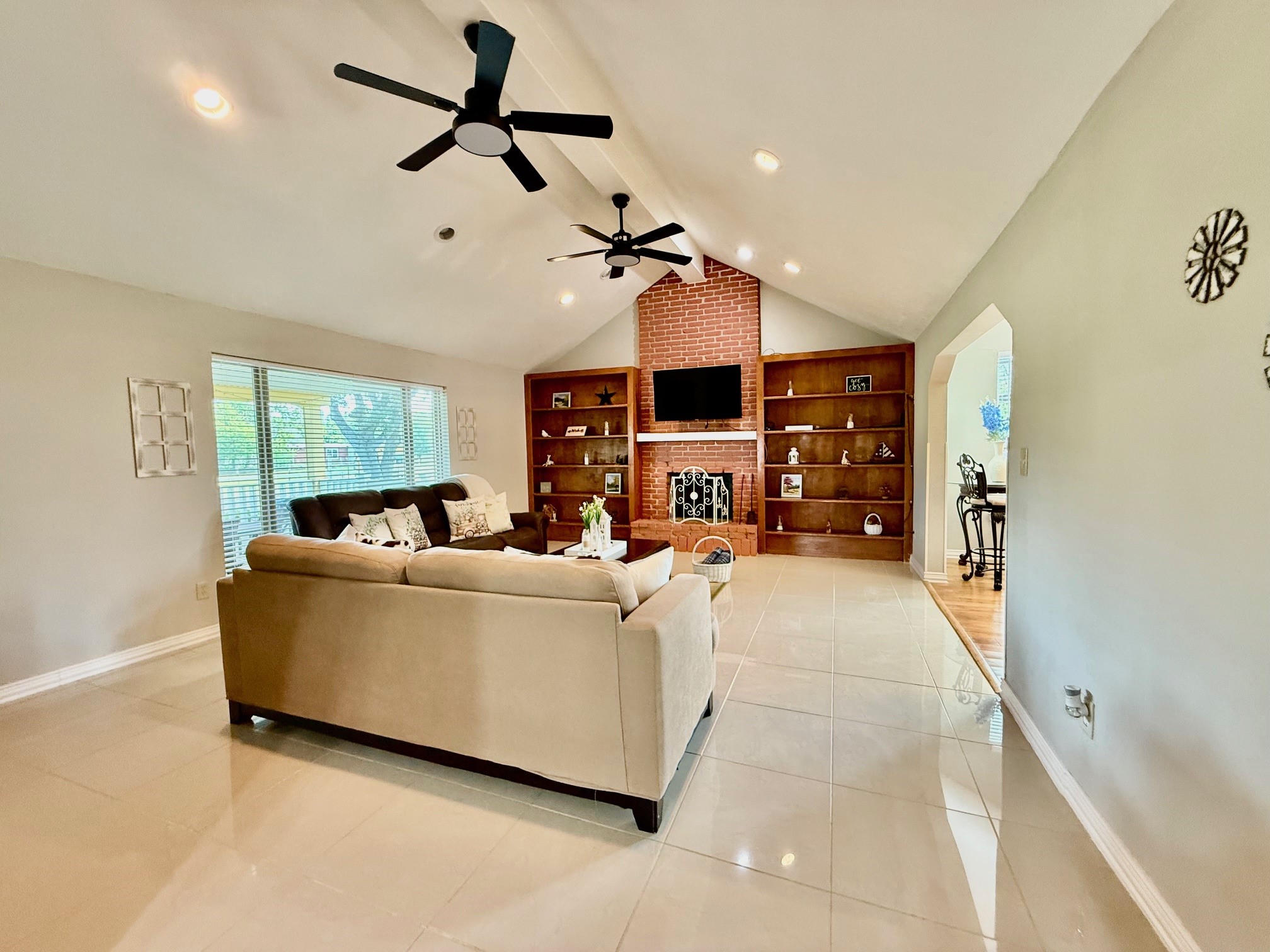 37110 Donigan Road Brookshire, TX 77423 - Photo 27 of 43 a living room with furniture and a chandelier