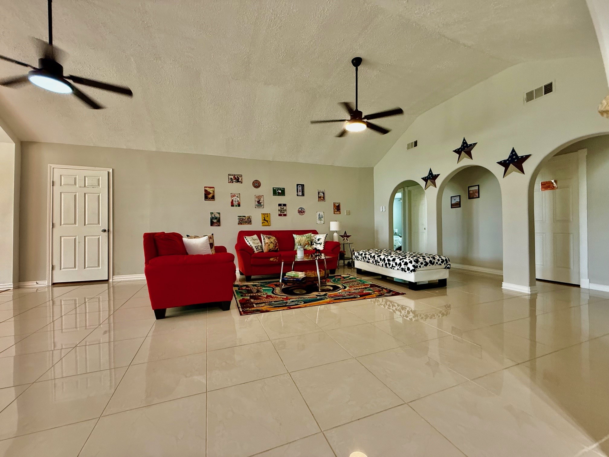 37110 Donigan Road Brookshire, TX 77423 - Photo 28 of 43 a living room with furniture and a chandelier