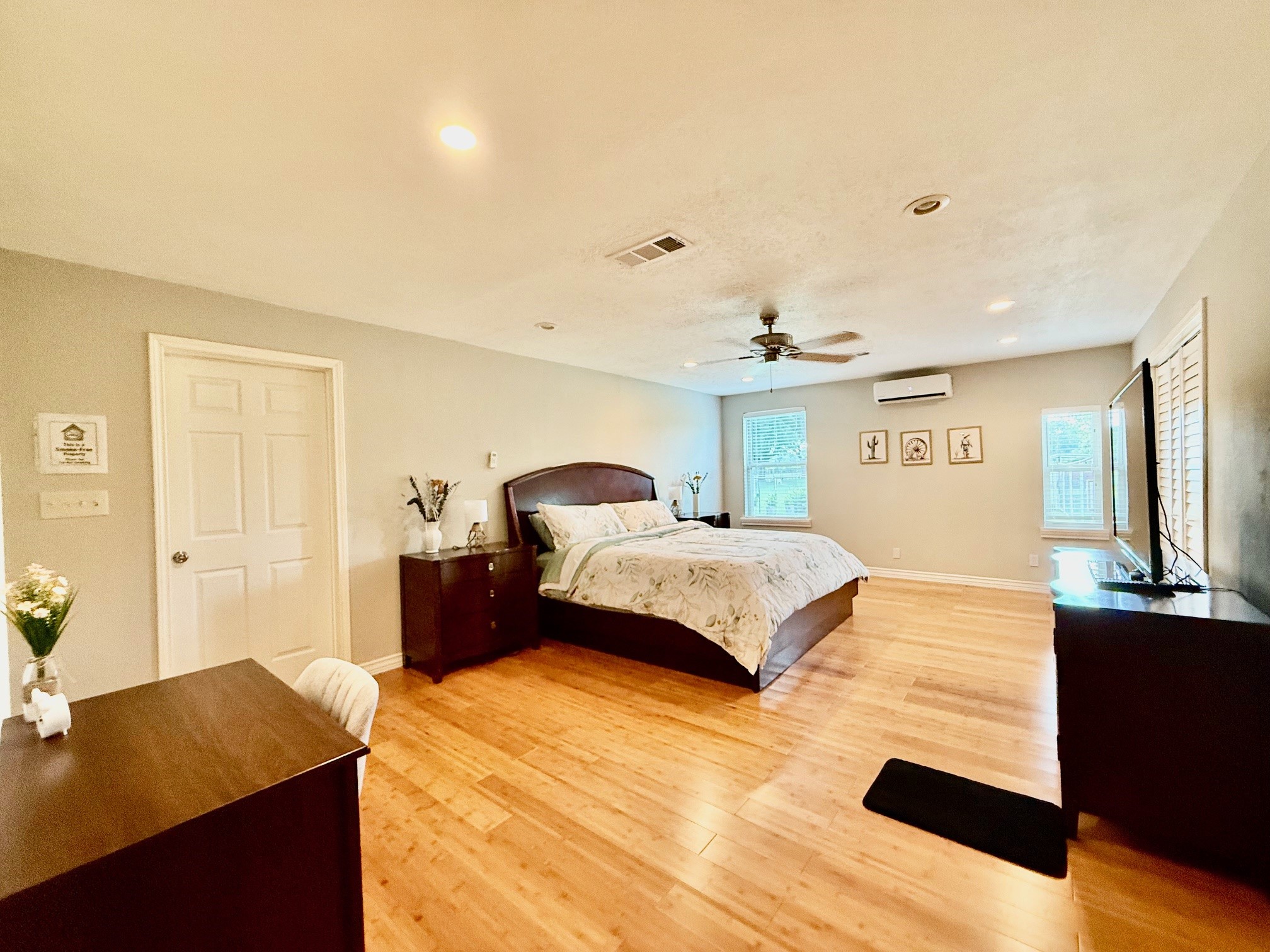 37110 Donigan Road Brookshire, TX 77423 - Photo 33 of 43 a bedroom with a bed and a chandelier