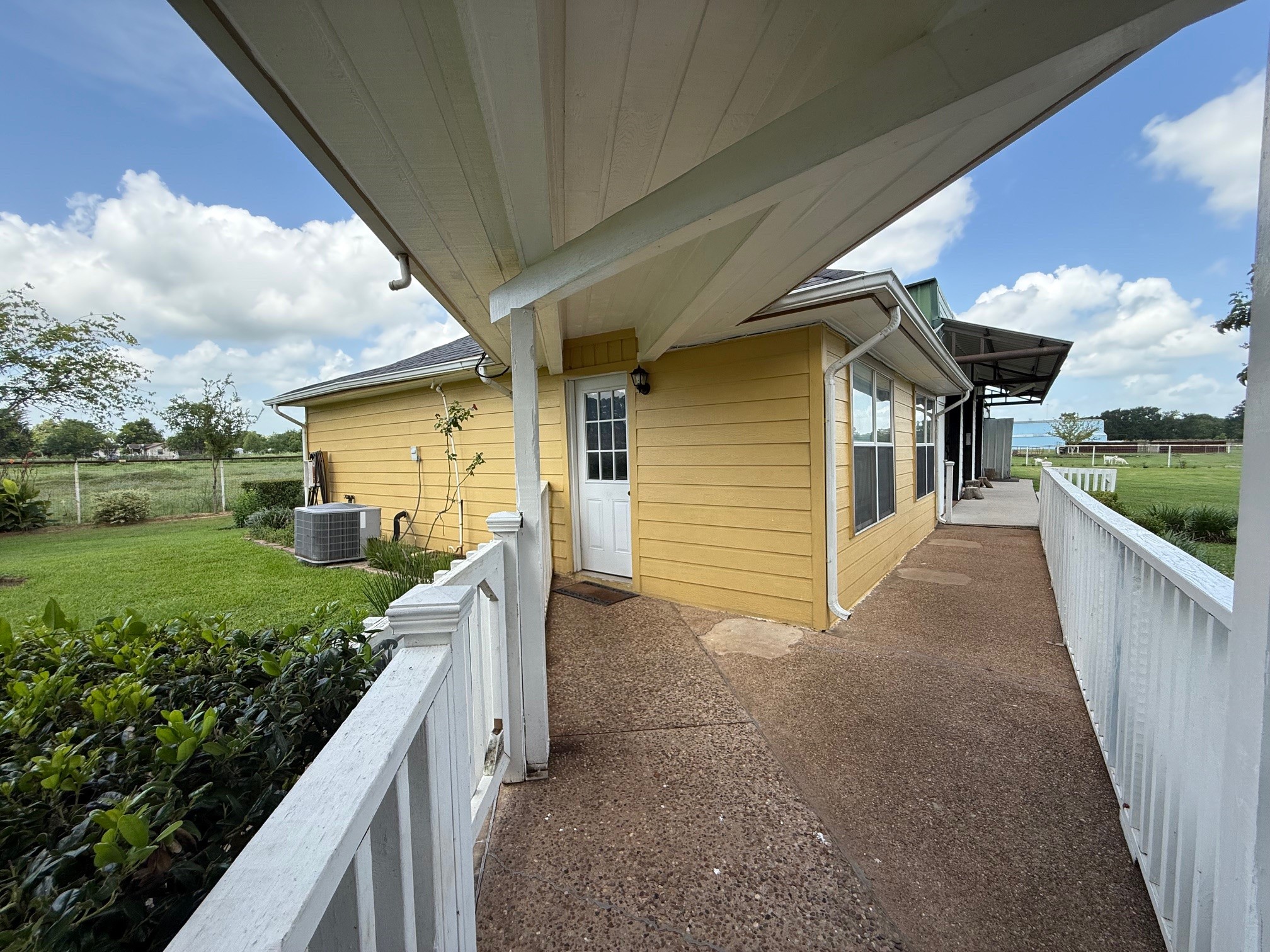 37110 Donigan Road Brookshire, TX 77423 - Photo 39 of 43 a view of a house with a backyard
