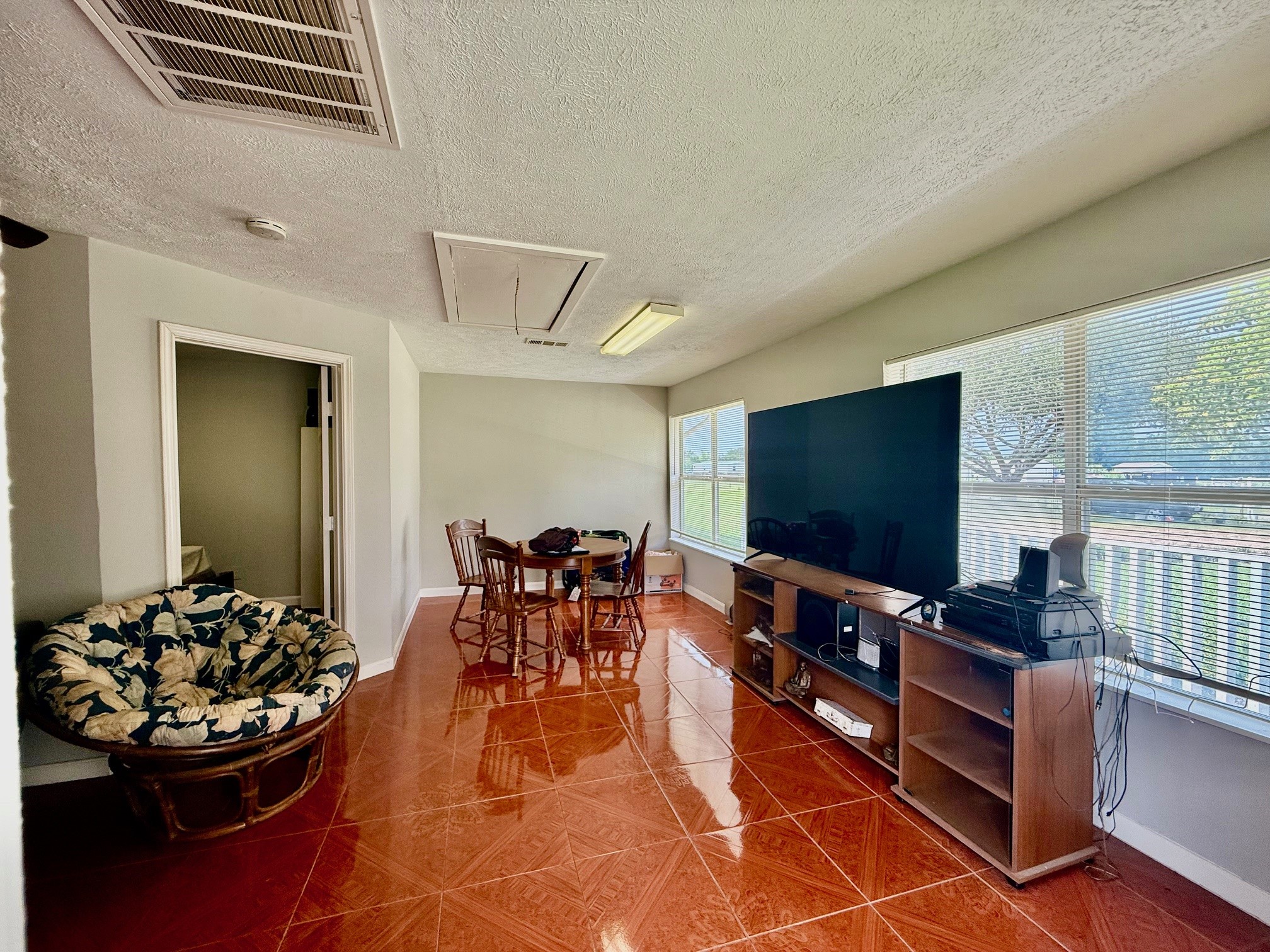 37110 Donigan Road Brookshire, TX 77423 - Photo 40 of 43 a living room with furniture and a flat screen tv