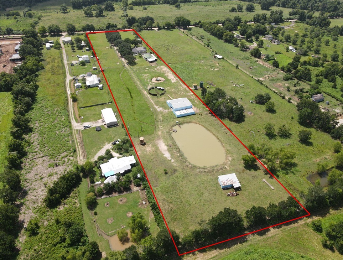 37110 Donigan Road Brookshire, TX 77423 - Photo 5 of 43 an aerial view of a residential houses with outdoor space and street view
