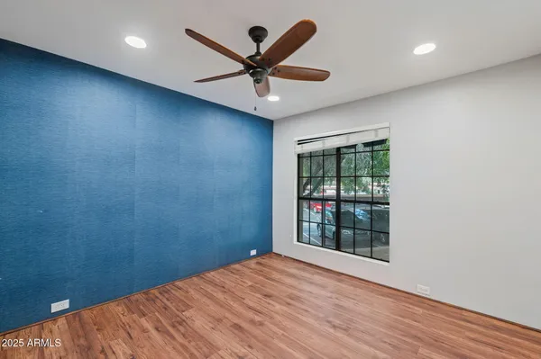 a view of an empty room with a window