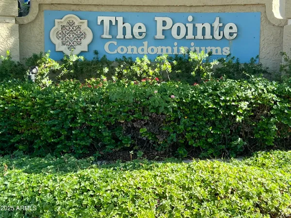 a sign that is on a wooden wall