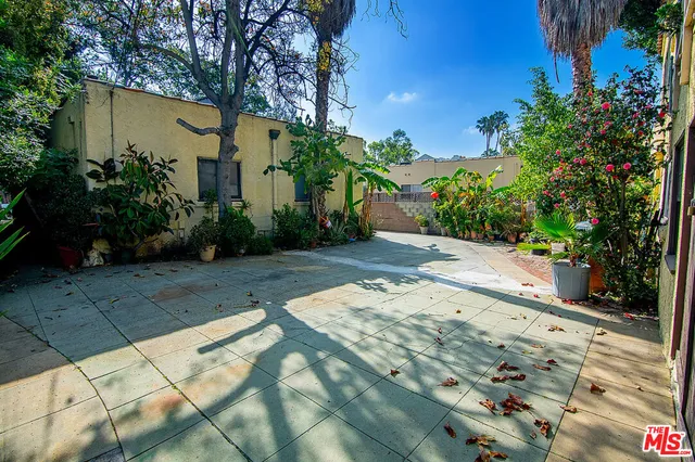 a view of a garden with pathway