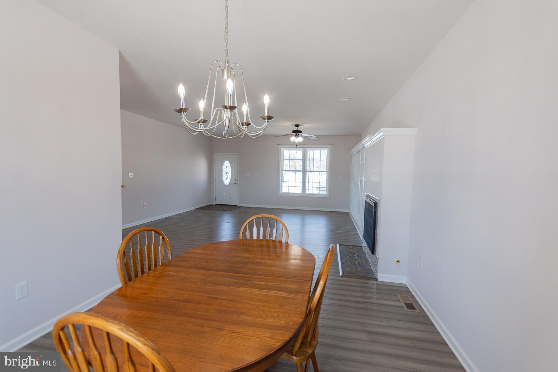 528 Delmar Orchard Road Martinsburg, WV 25403 - Photo 11 of 72 a view of a dining room with furniture and chandelier