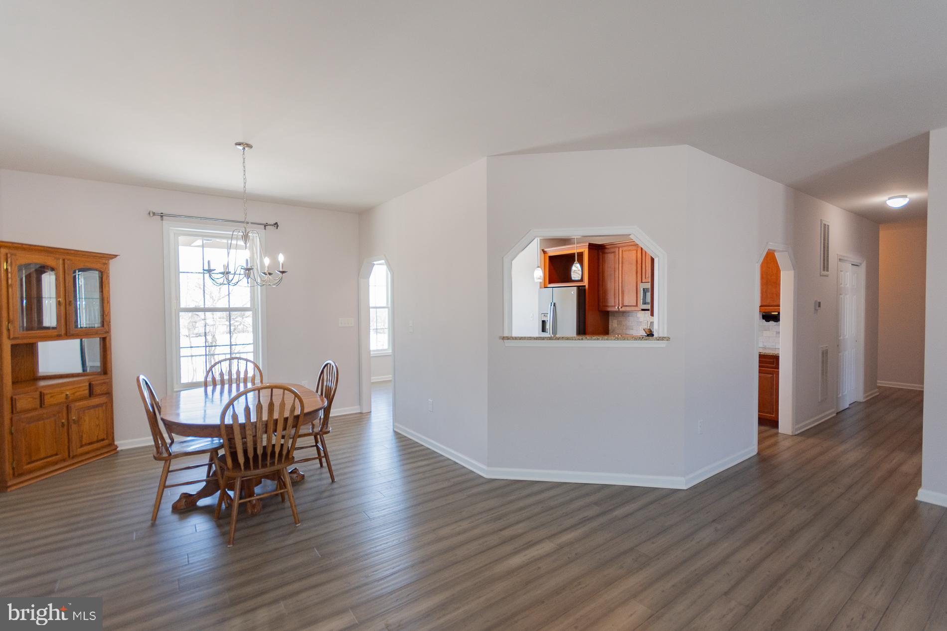 528 Delmar Orchard Road Martinsburg, WV 25403 - Photo 8 of 72 a view of a livingroom with furniture and windows