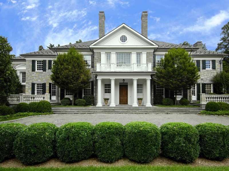 47 Round Hill Road Greenwich, CT 06831 - Photo 1 of 22 front view of a house with a yard