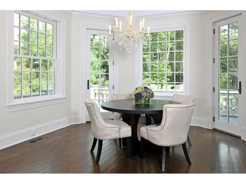 47 Round Hill Road Greenwich, CT 06831 - Photo 14 of 22 a view of a dining room with furniture and wooden floor