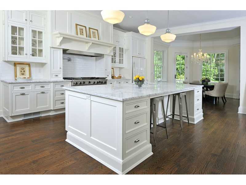 47 Round Hill Road Greenwich, CT 06831 - Photo 15 of 22 a kitchen with a stove a sink and a refrigerator