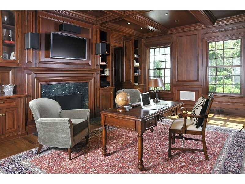 47 Round Hill Road Greenwich, CT 06831 - Photo 9 of 22 a living room with furniture a fireplace and wooden floor