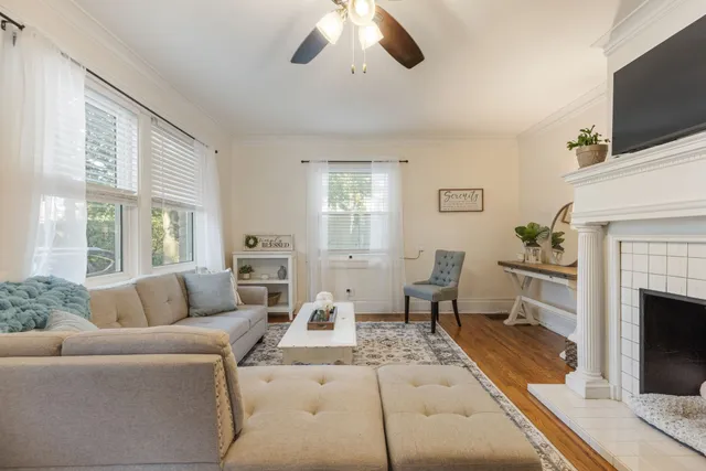 a bathroom with a sink toilet and a mirror