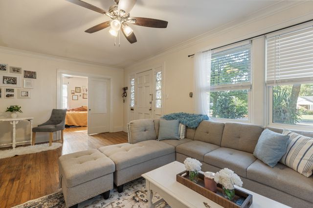 a bathroom with a double vanity sink mirror and shower