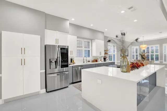 a view of kitchen center island and couches