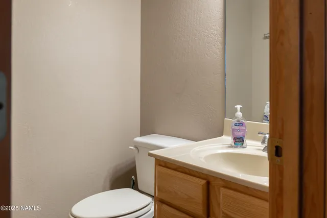 a bathroom with a sink and a toilet