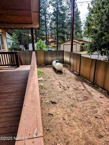 a view of balcony with furniture