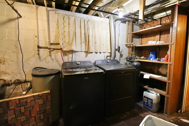 a view of an entryway with a mirror